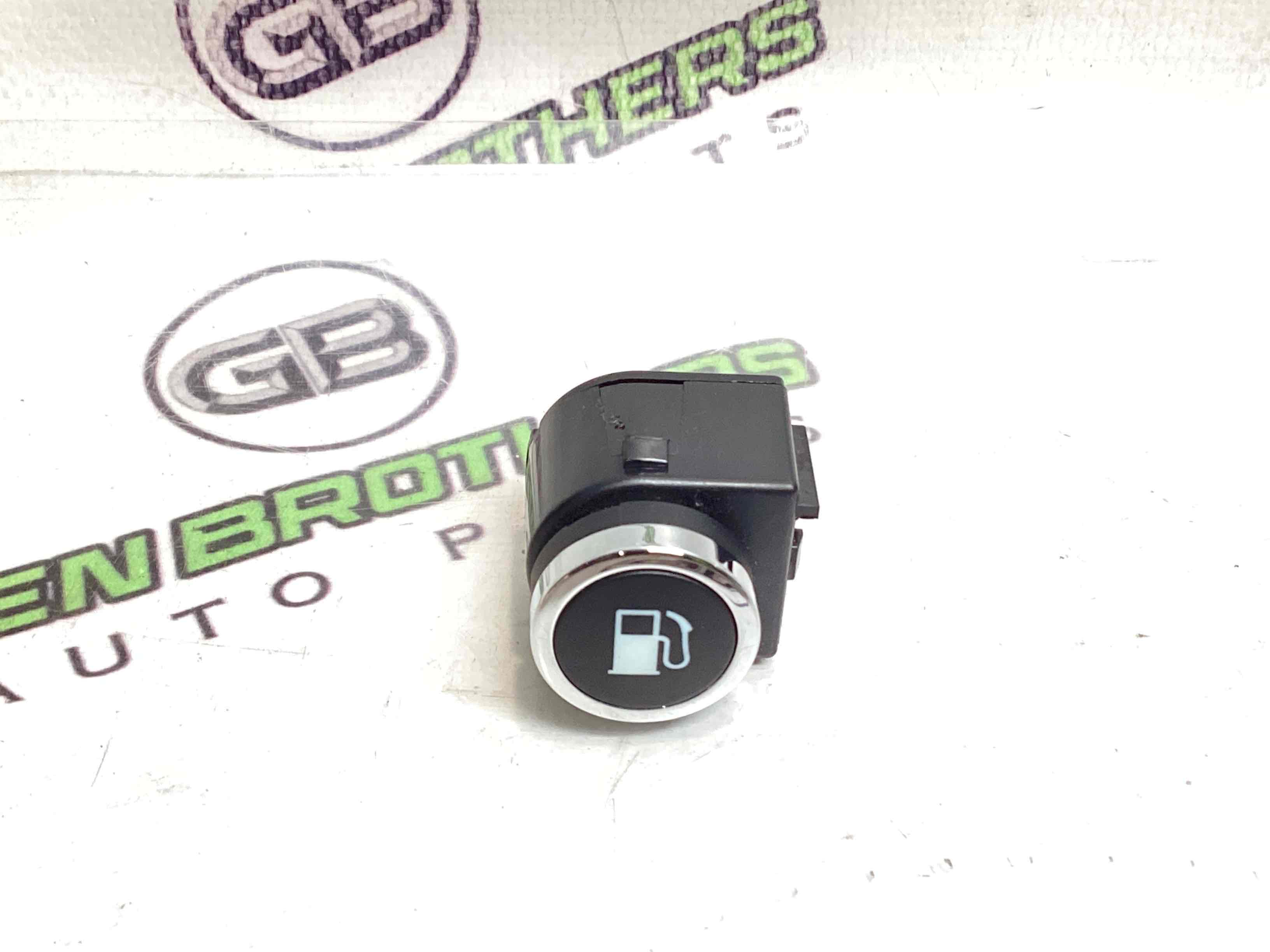 Кнопка відкриття лючка бензобака