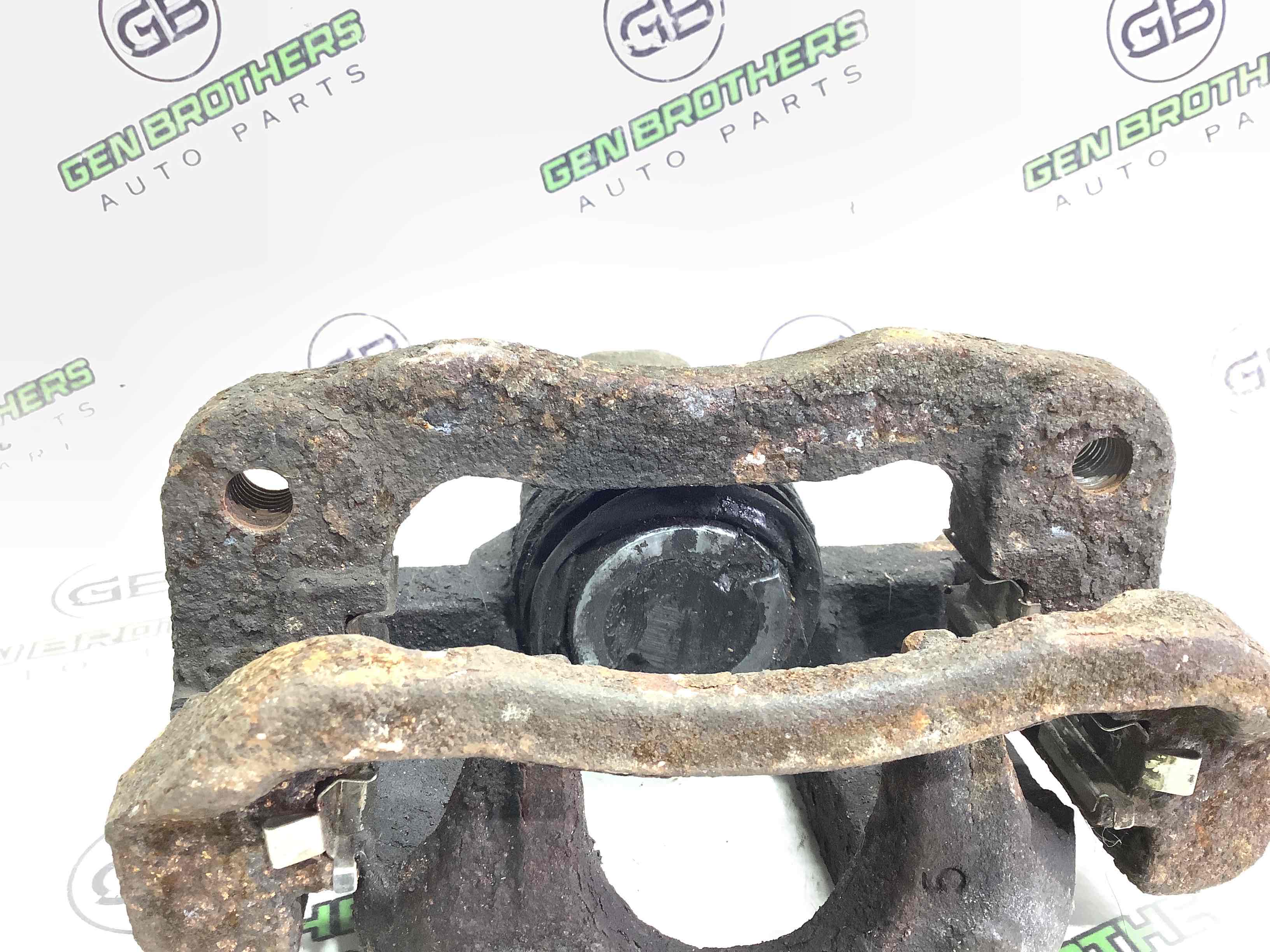 Суппорт задний левый