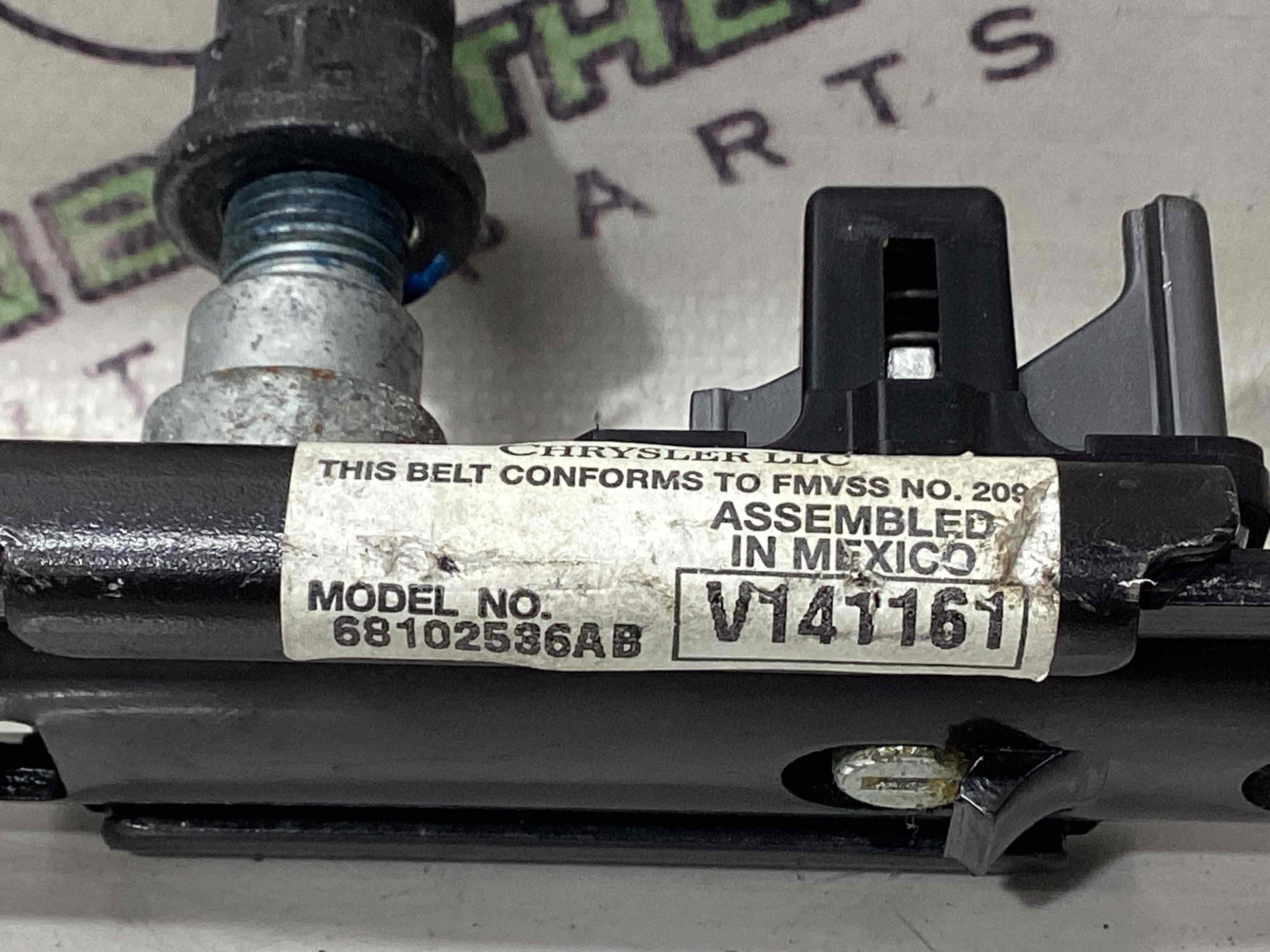 Регулятор висоти ременя безпеки