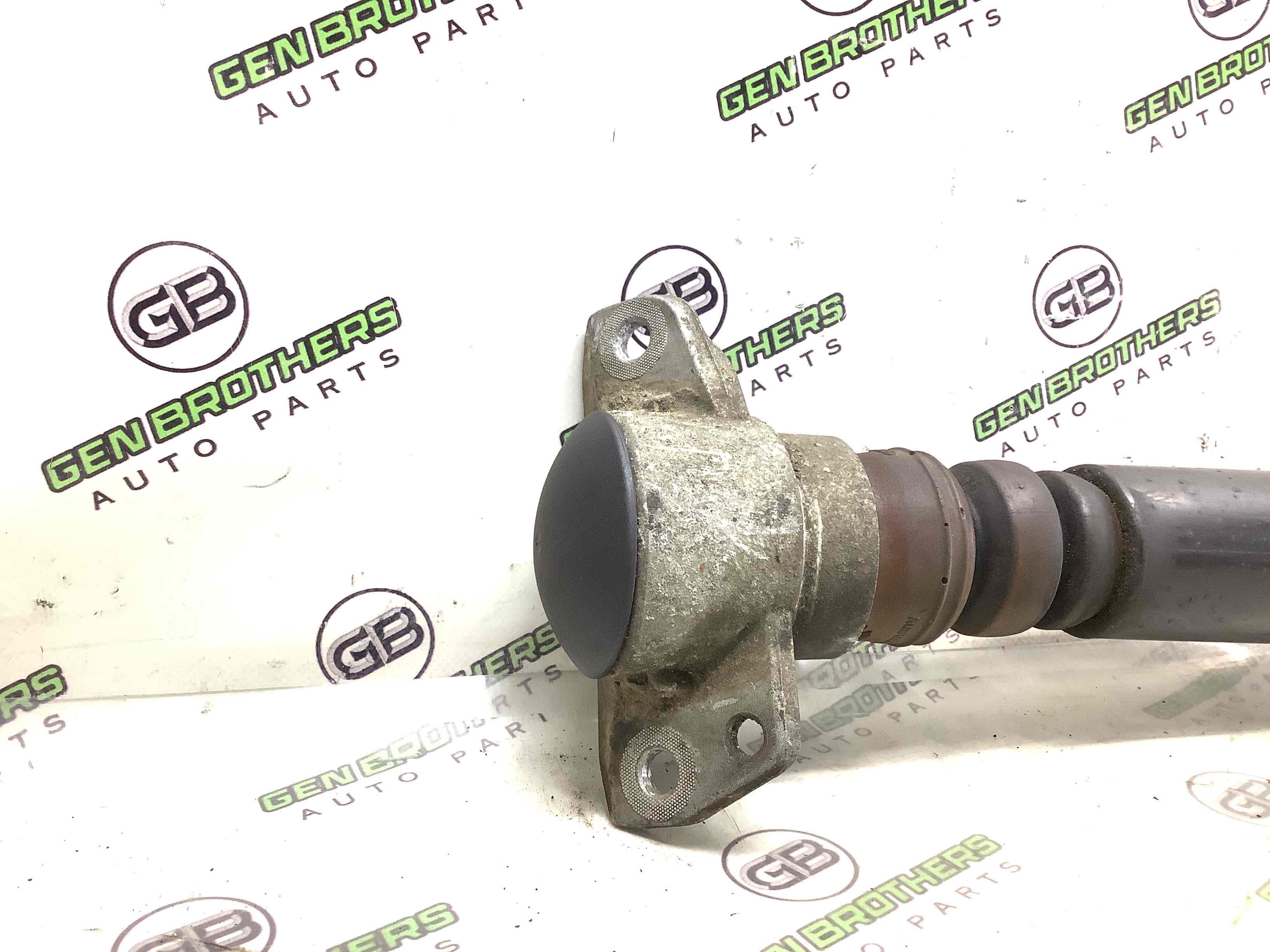 Амортизатор задний левый