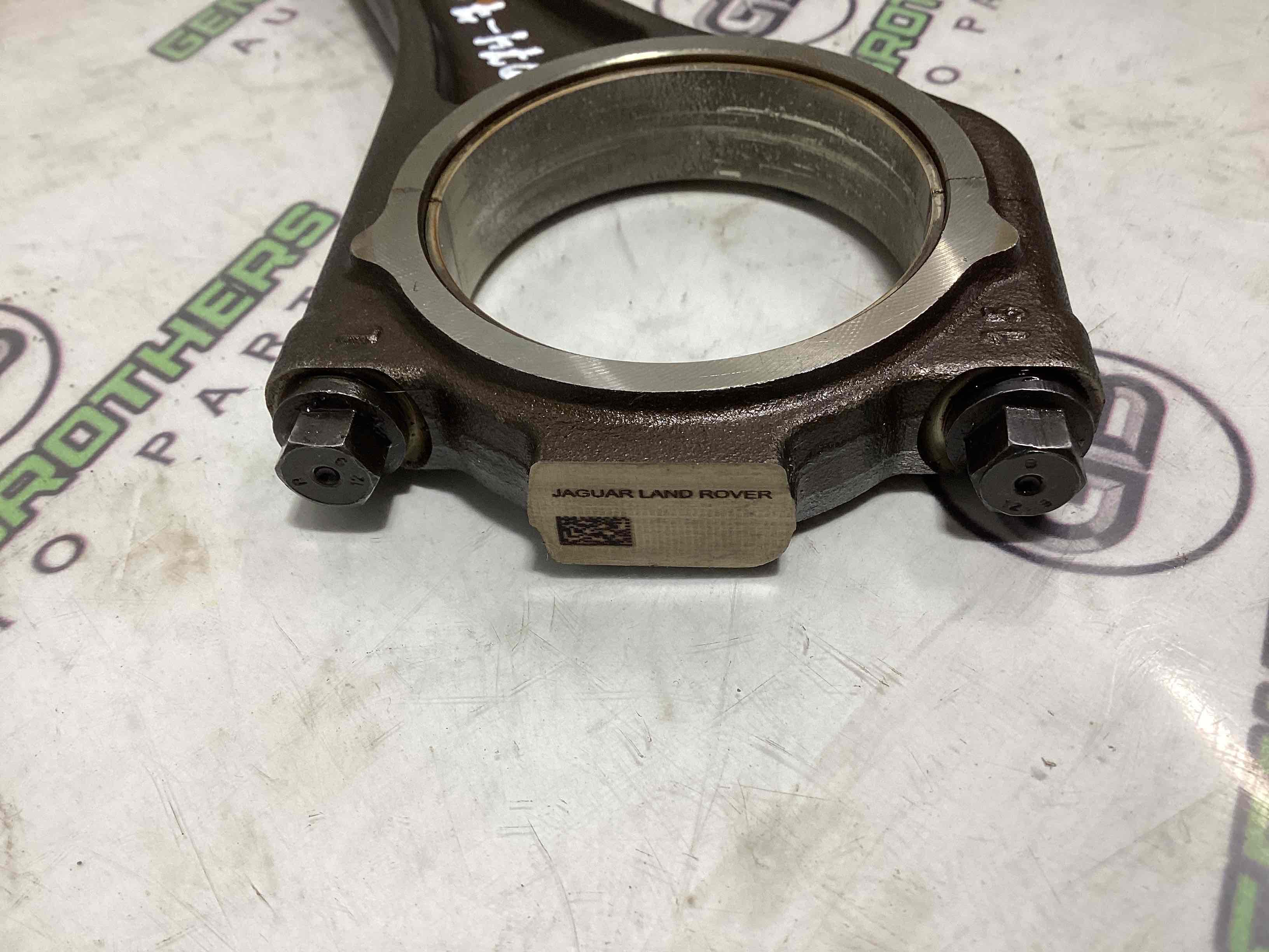 Шатун поршня двигуна