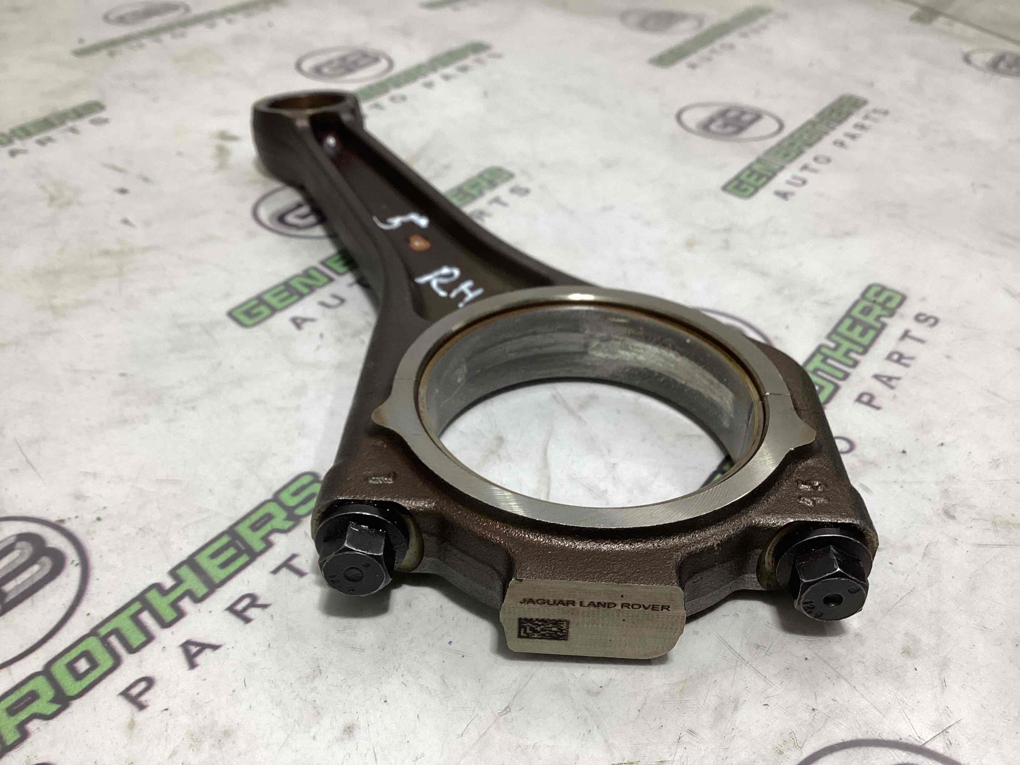 Шатун поршня двигуна