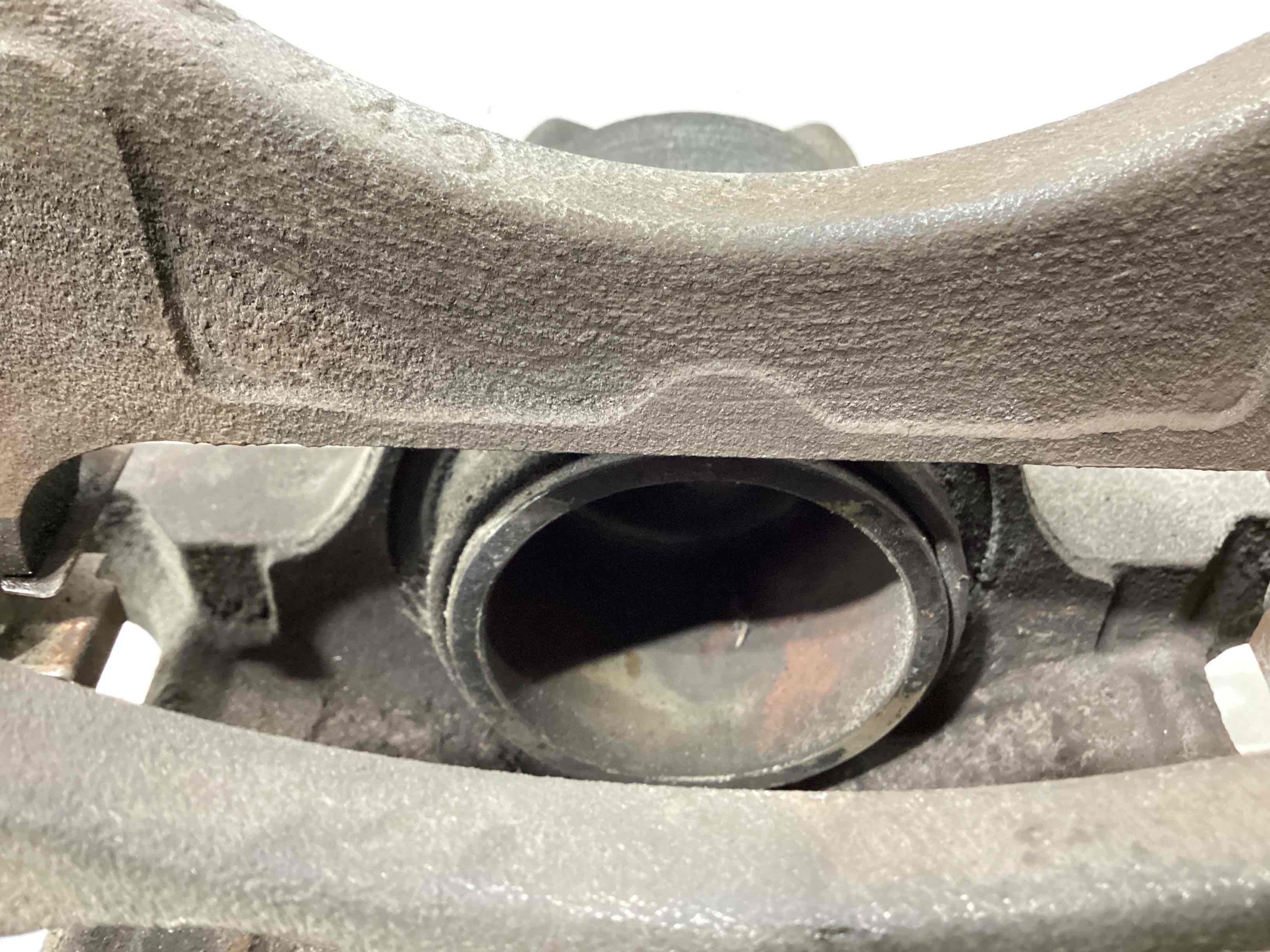 Супорт передній лівий