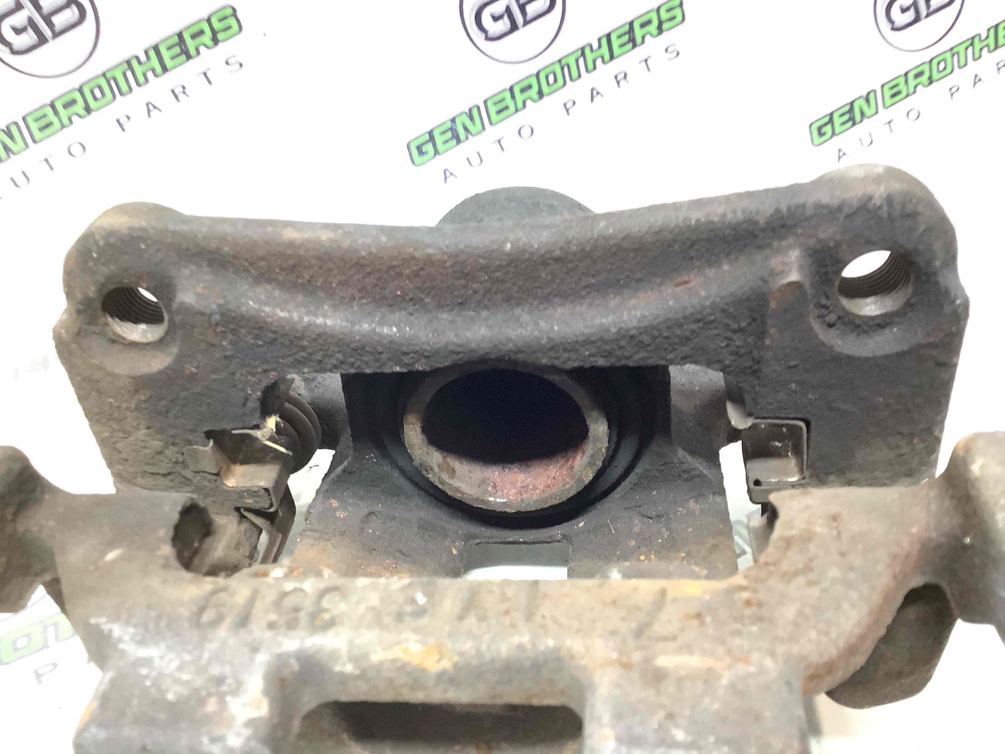 Супорт задній правий