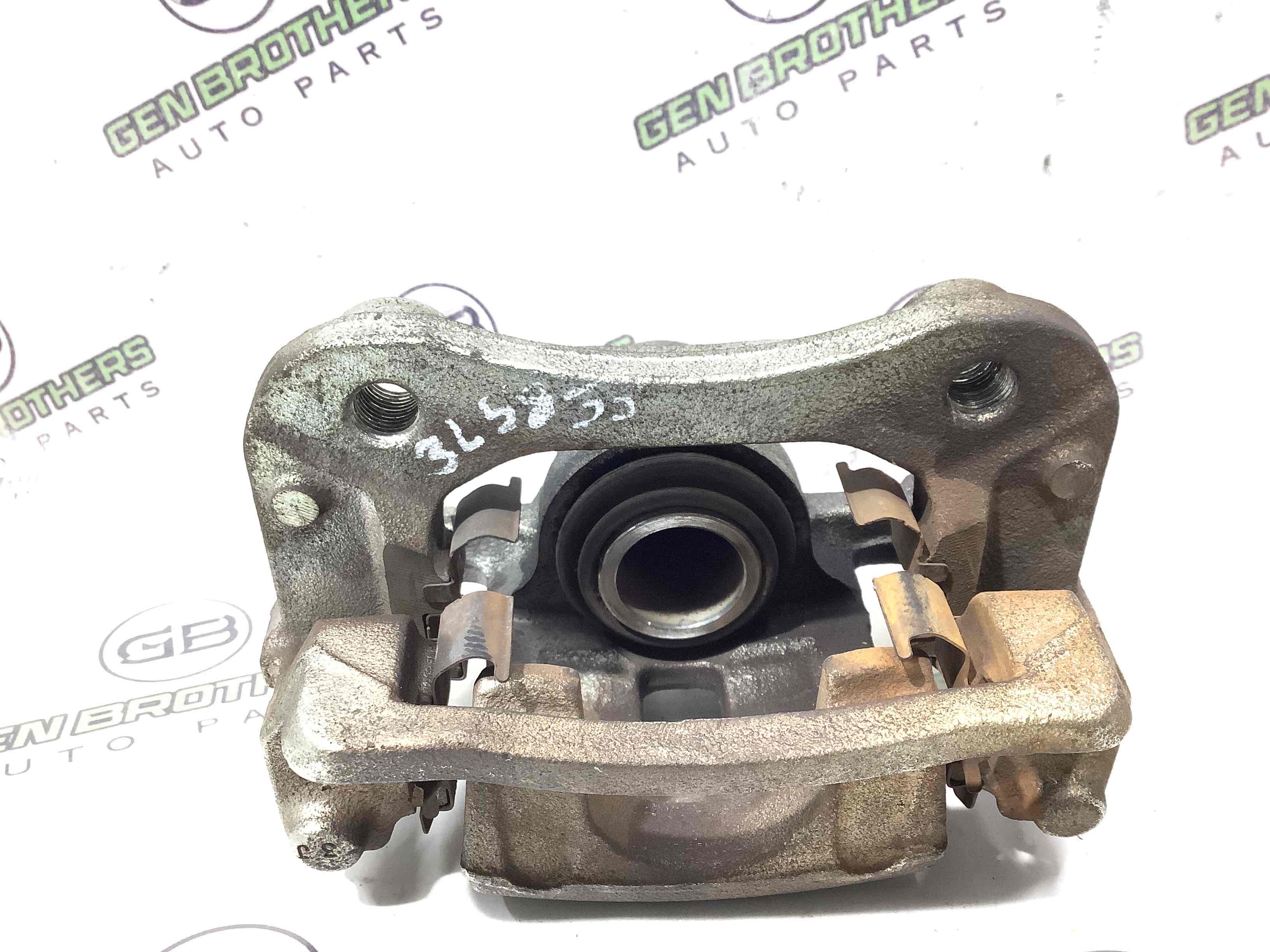 Супорт задній правий