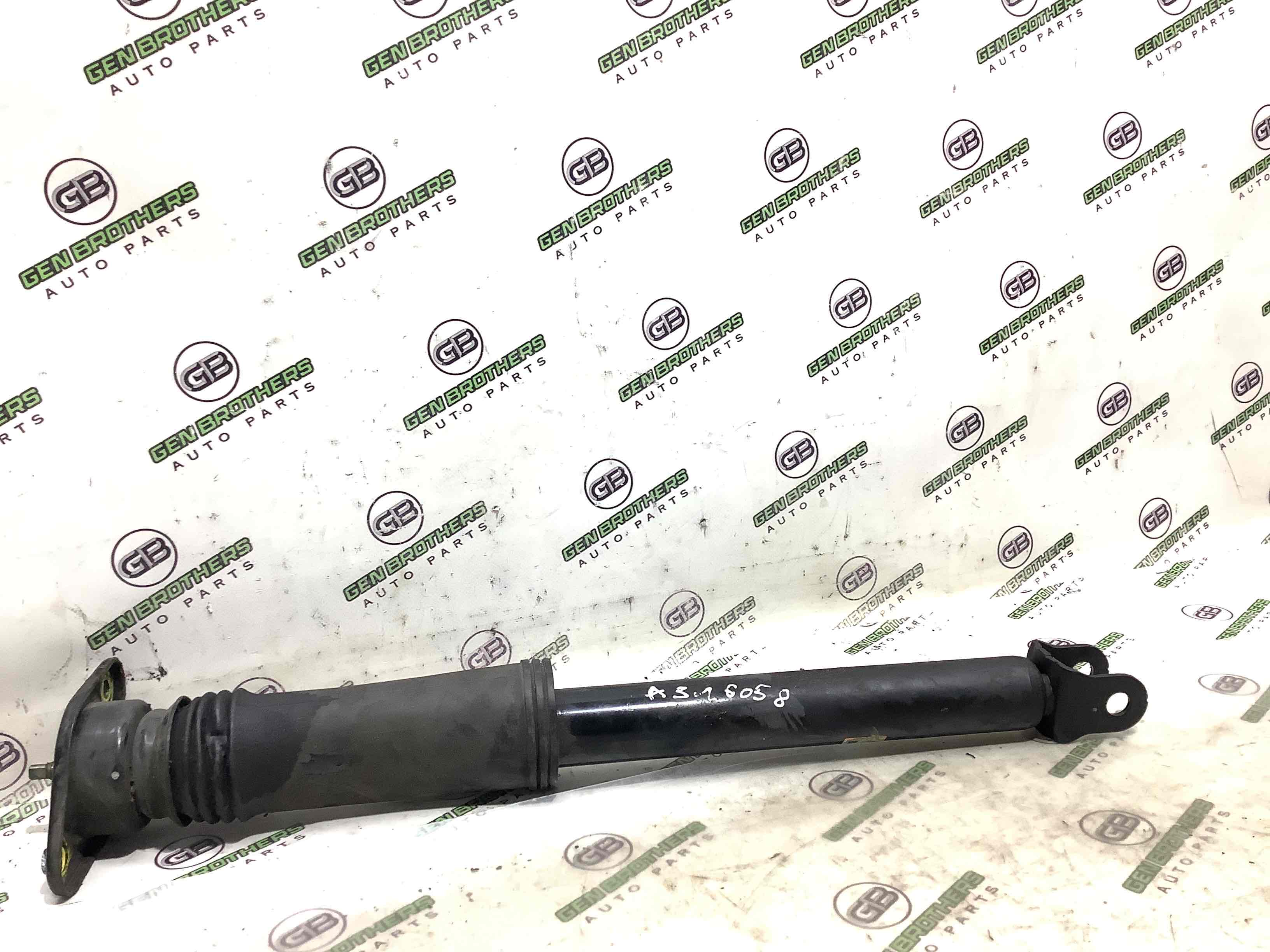 Амортизатор задний левый