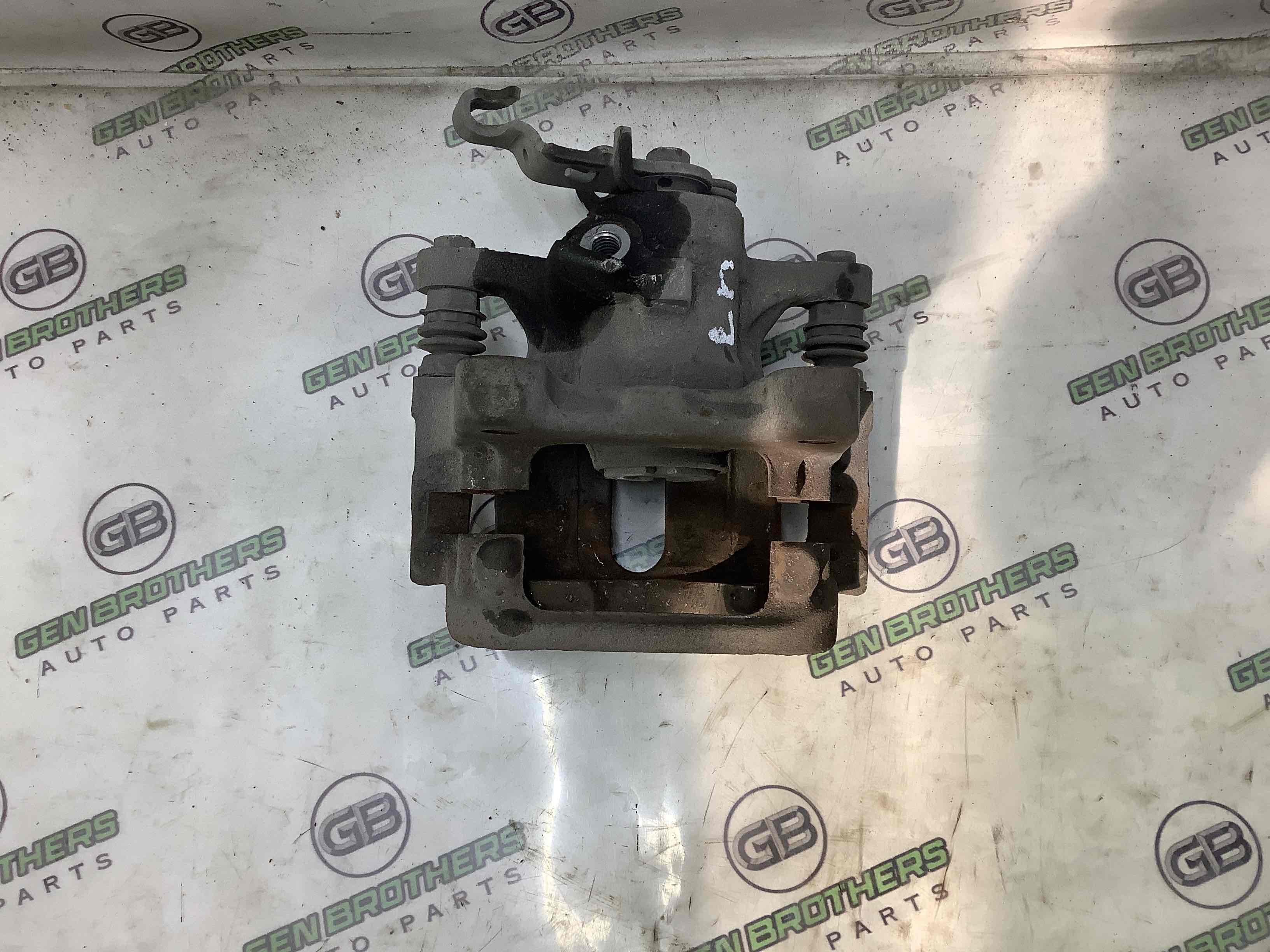 Супорт задній лівий