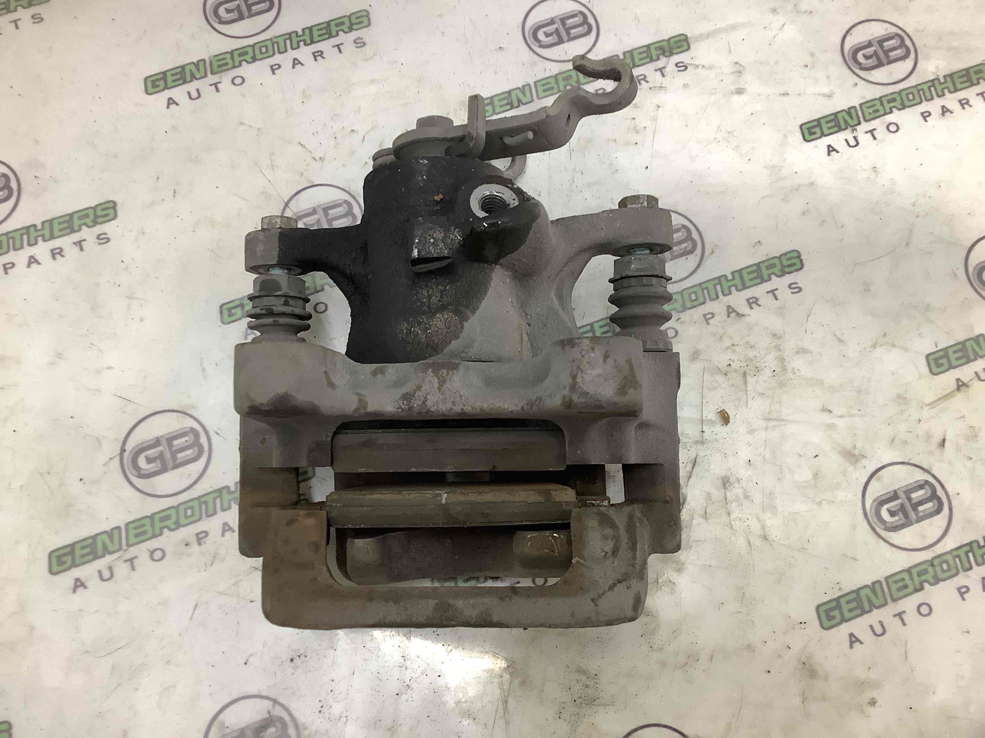 Супорт задній правий