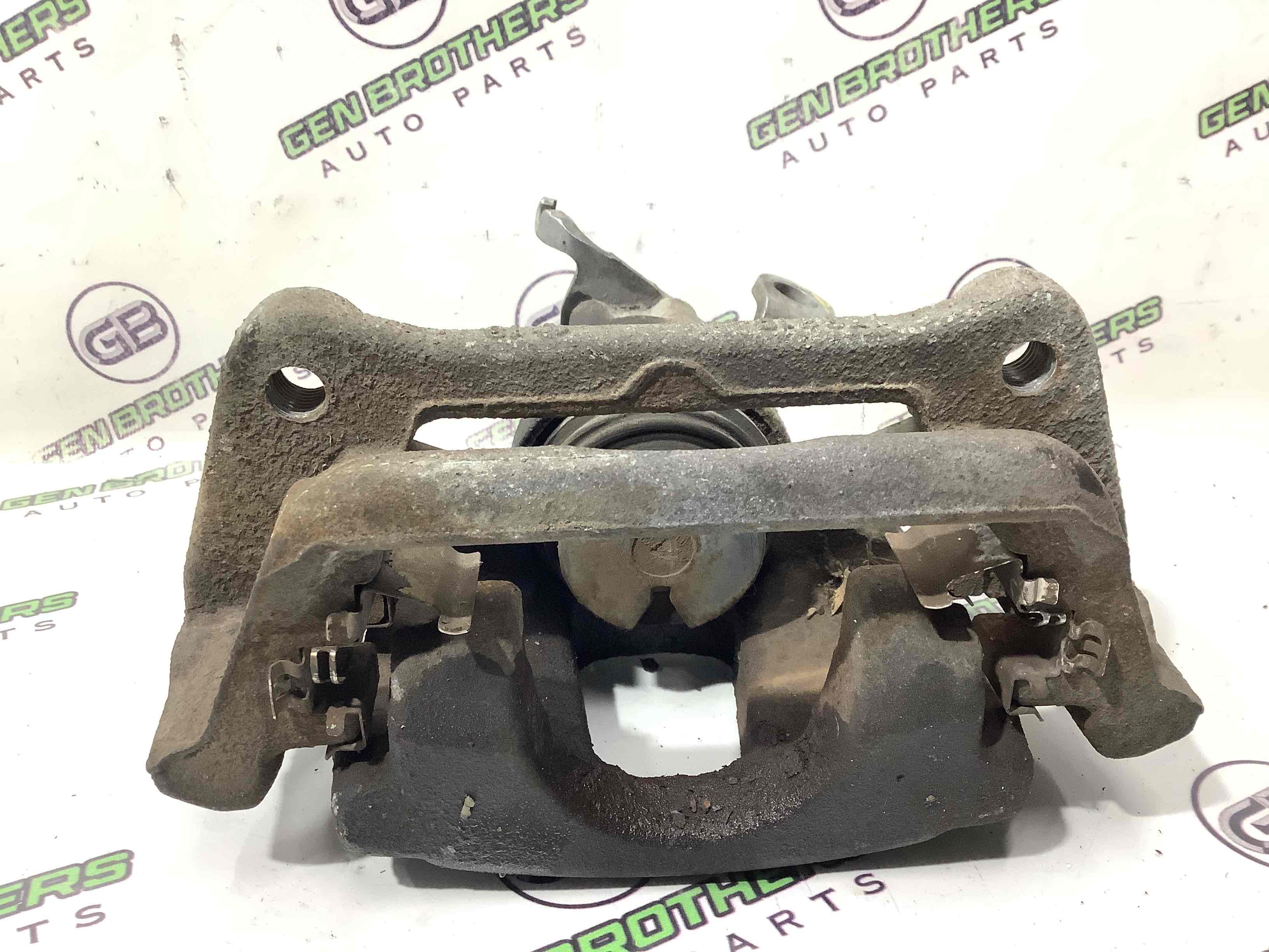 Суппорт задний левый