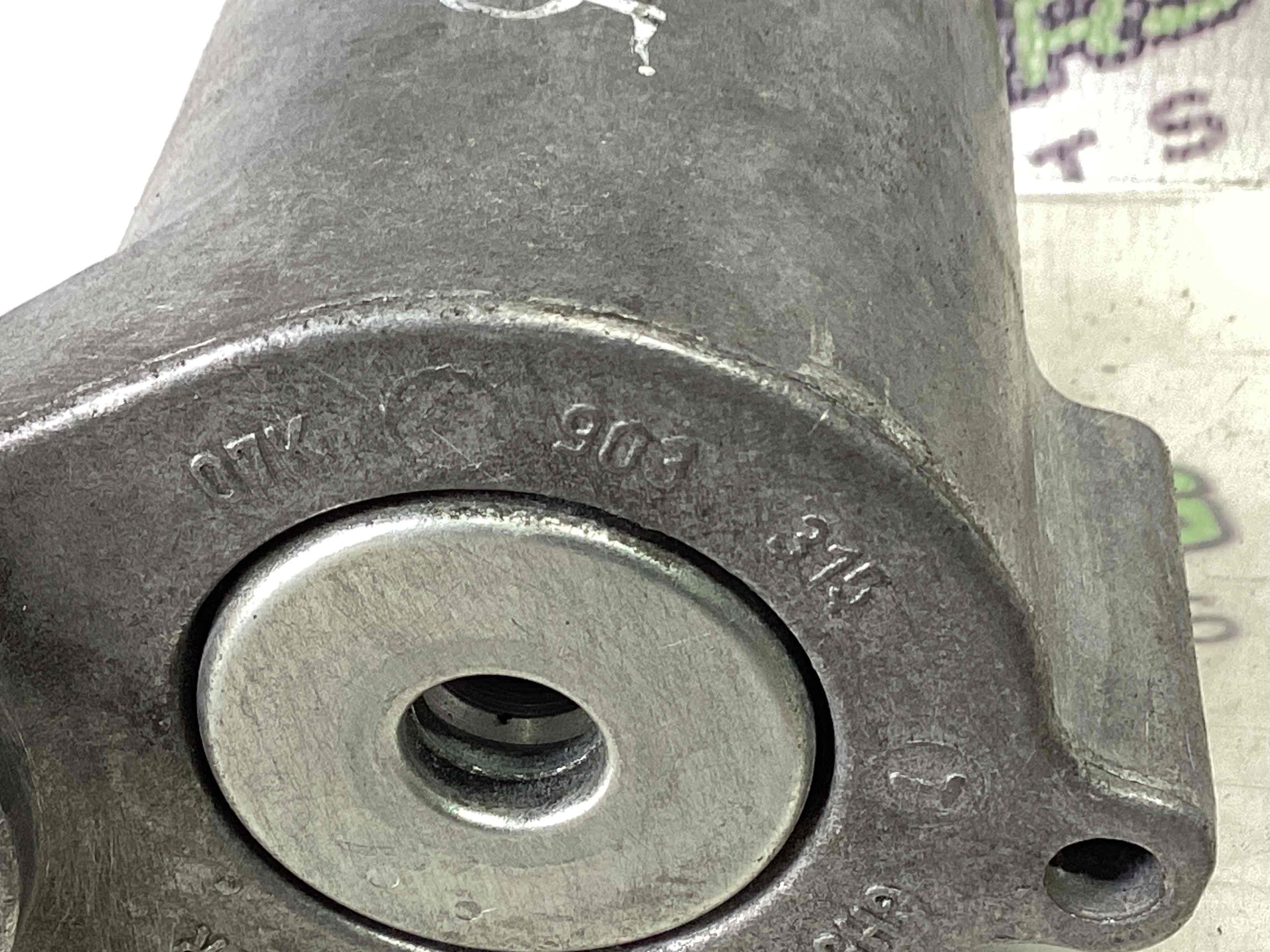 Механізм натягу ременя, ланцюга, ролика