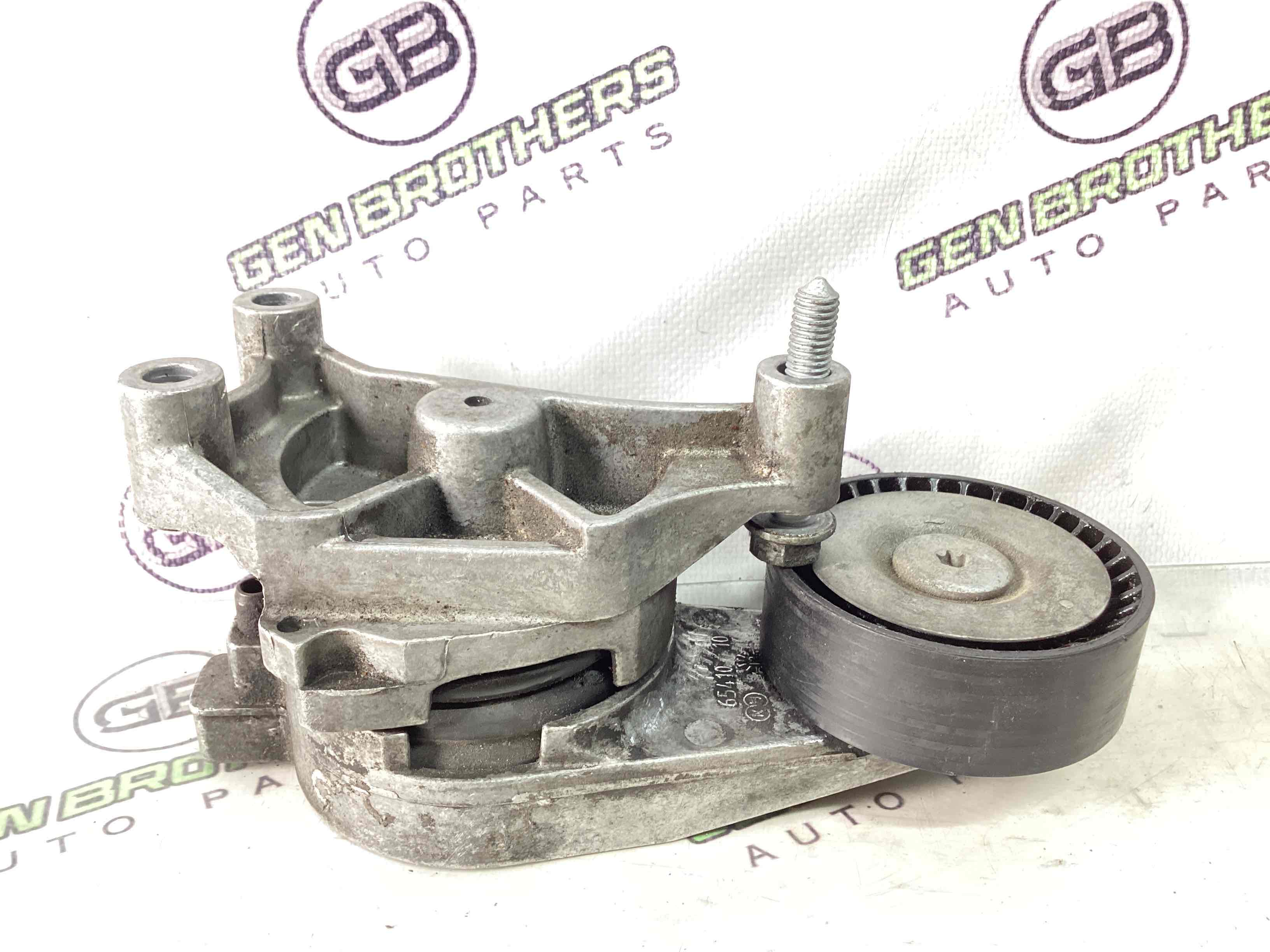 Механізм натягу ременя, ланцюга, ролика