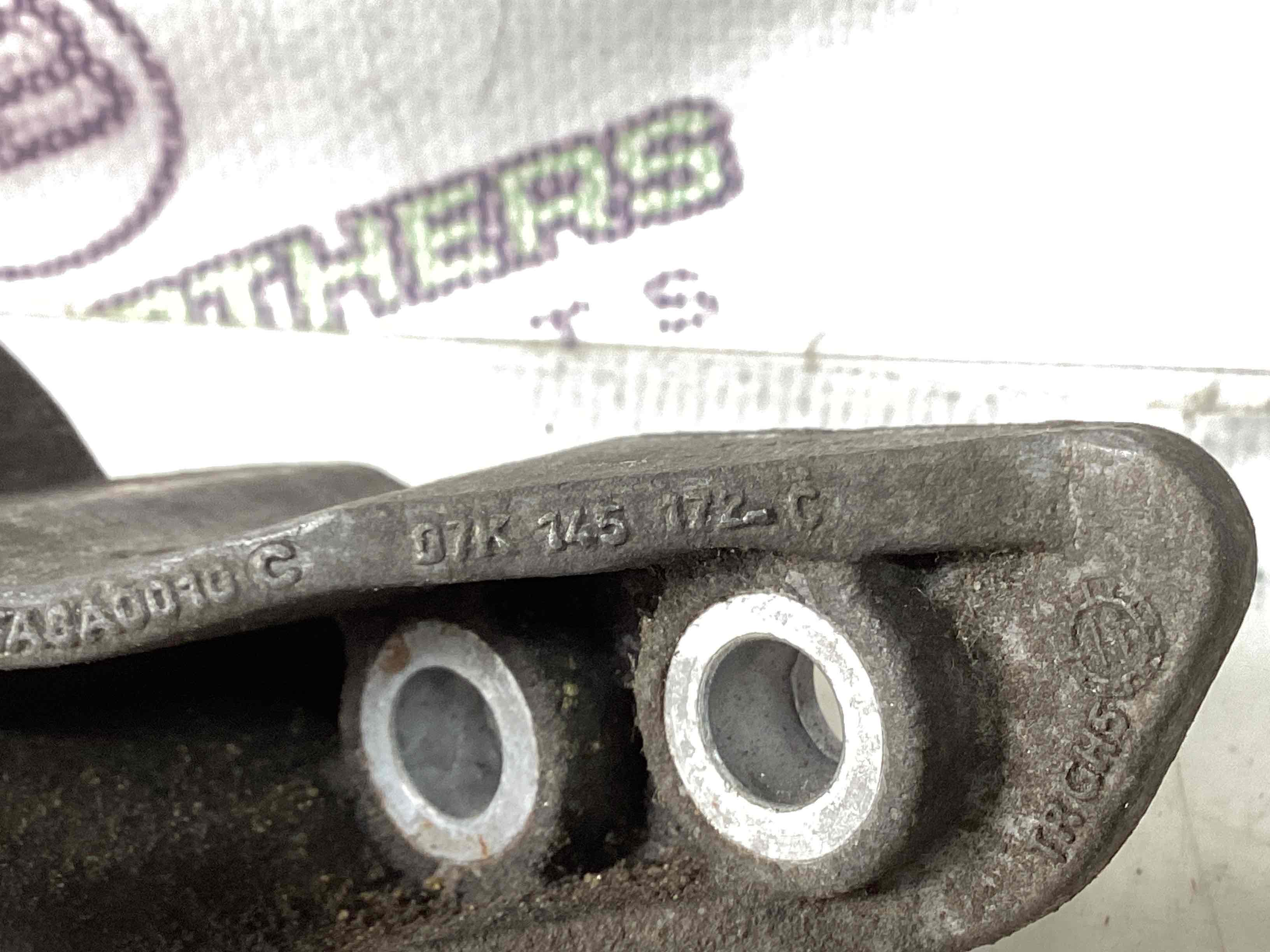 Механізм натягу ременя, ланцюга, ролика