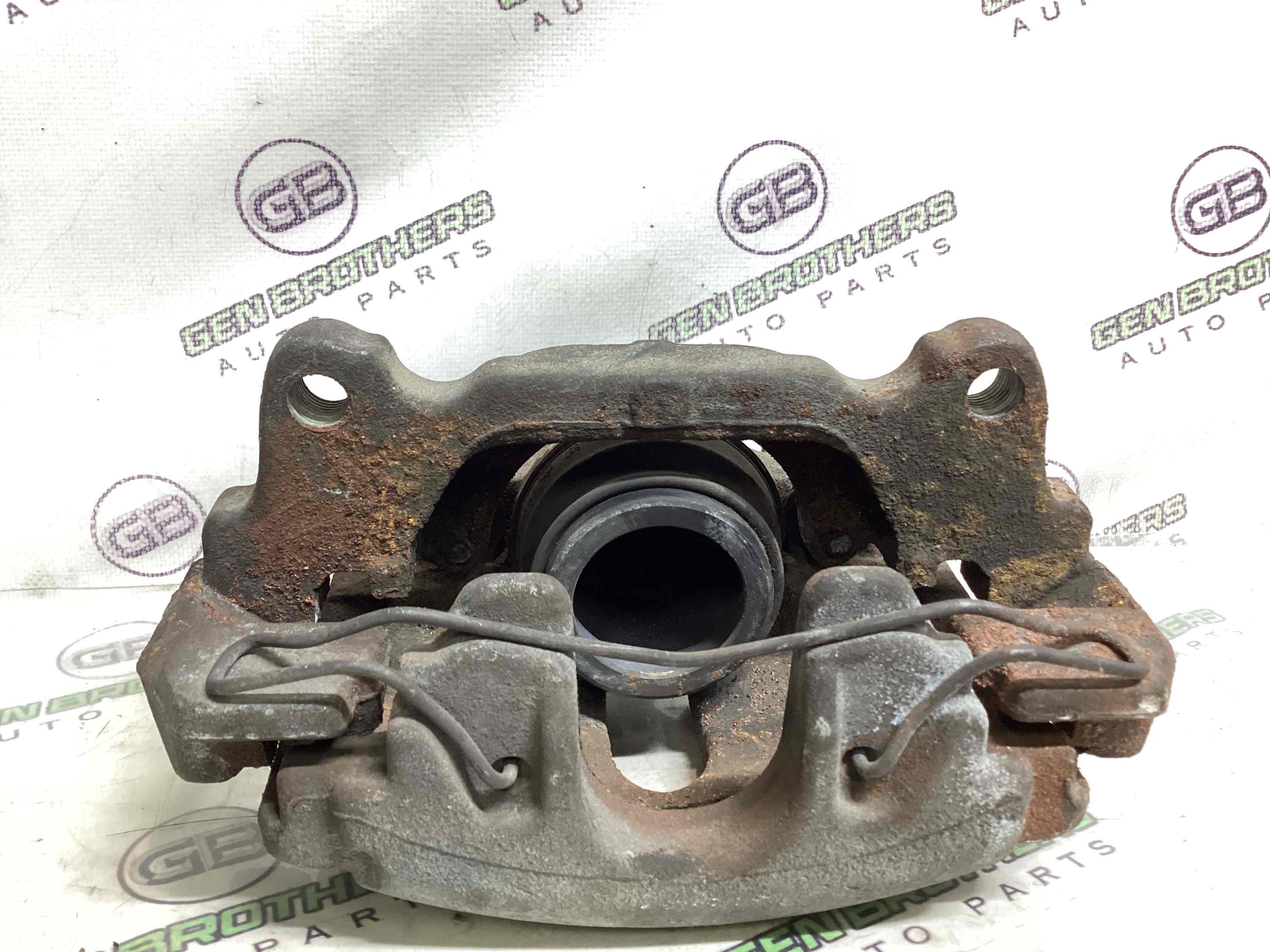 Супорт передній лівий