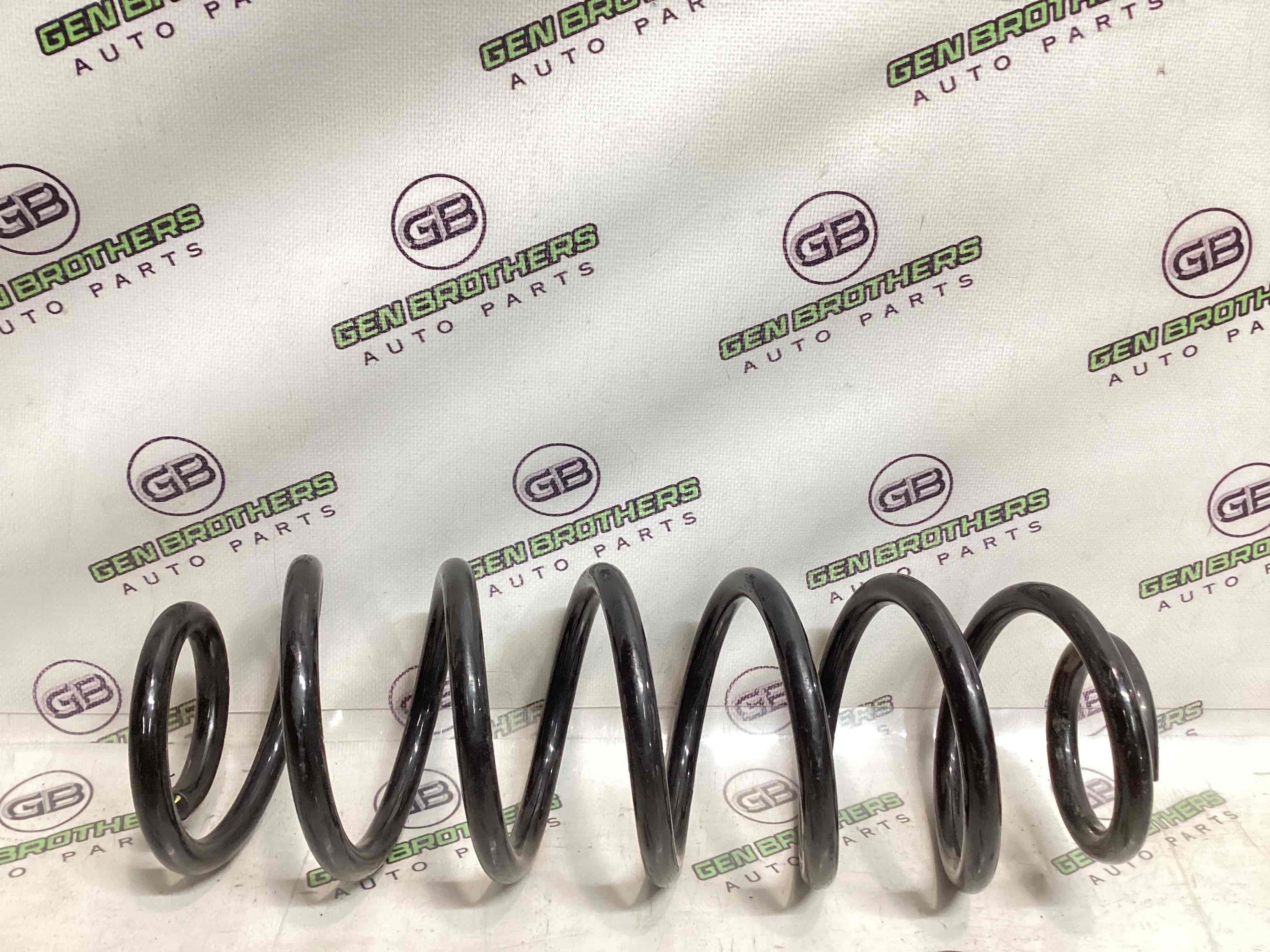 Пружина задня