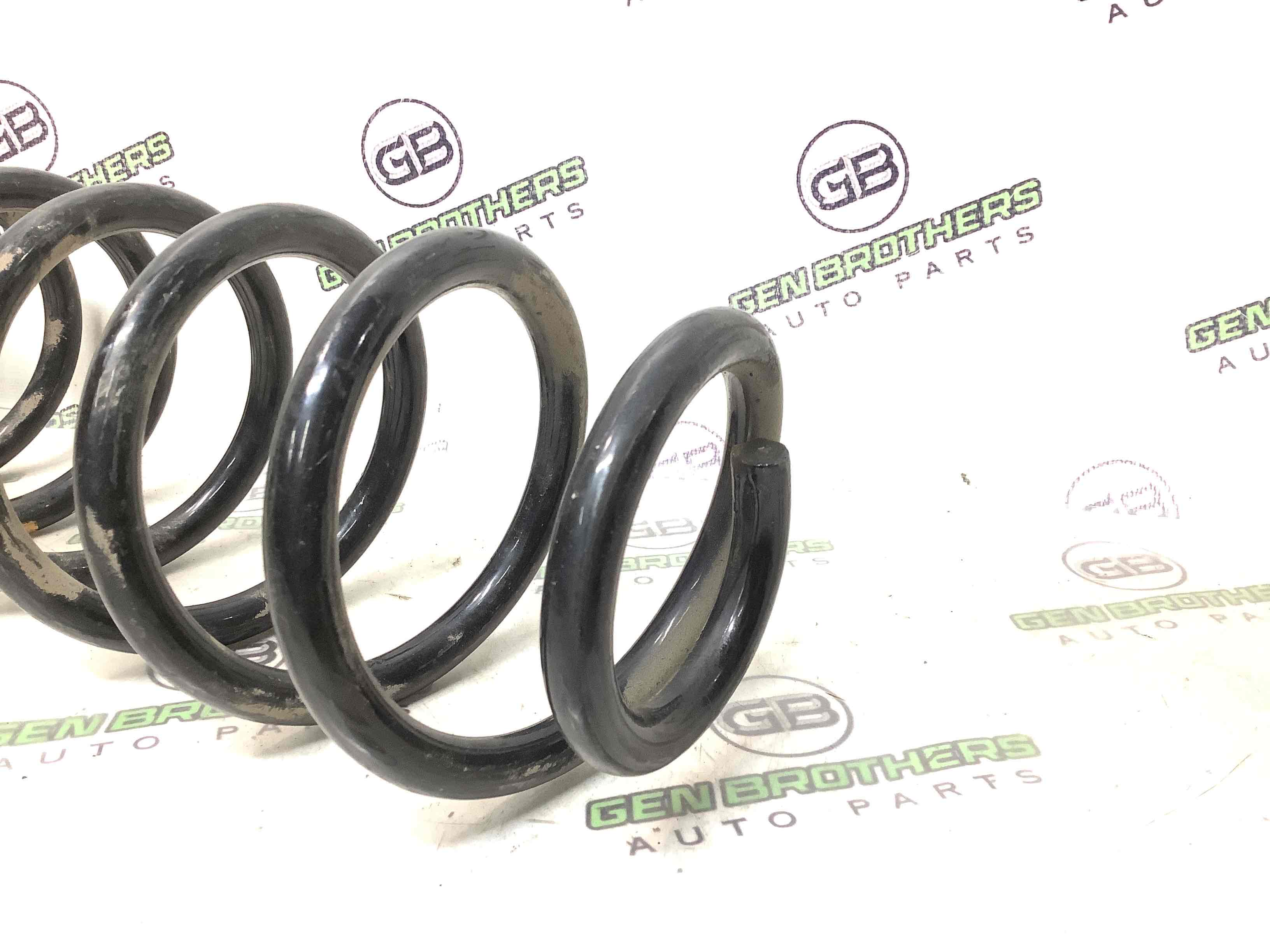 Пружина задня