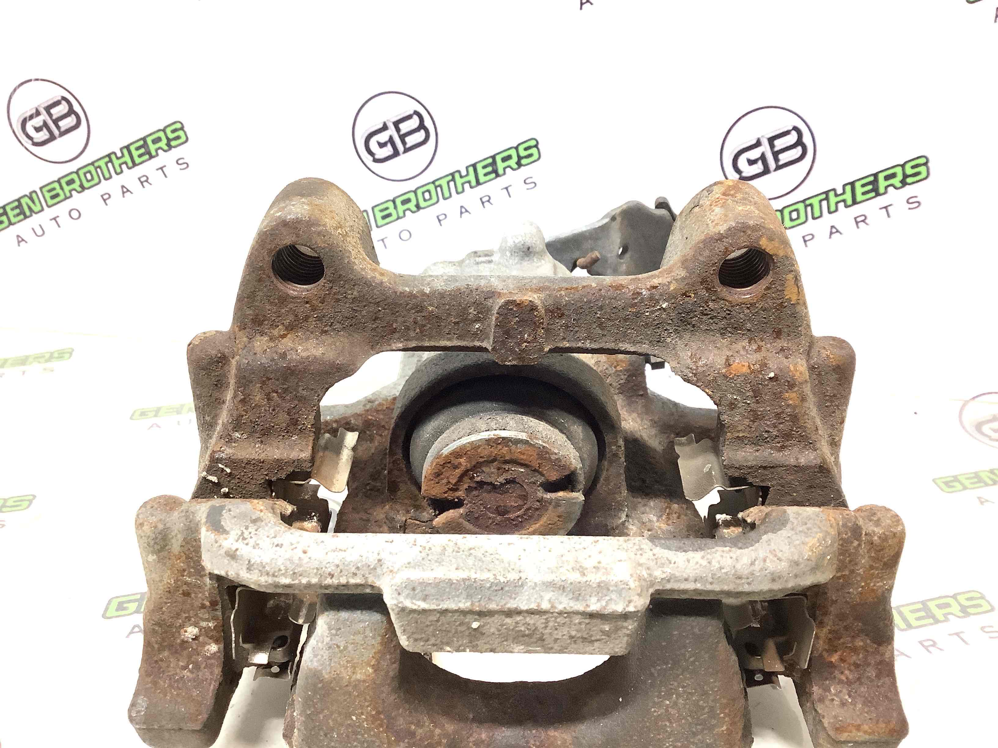 Супорт задній правий