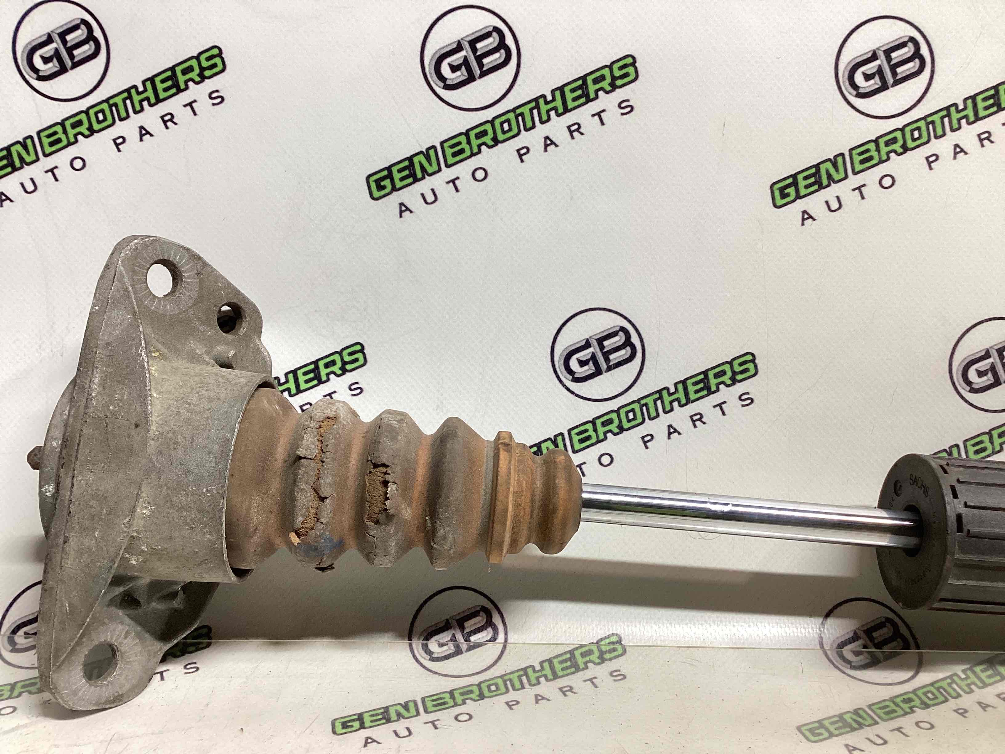 Амортизатор задній лівий