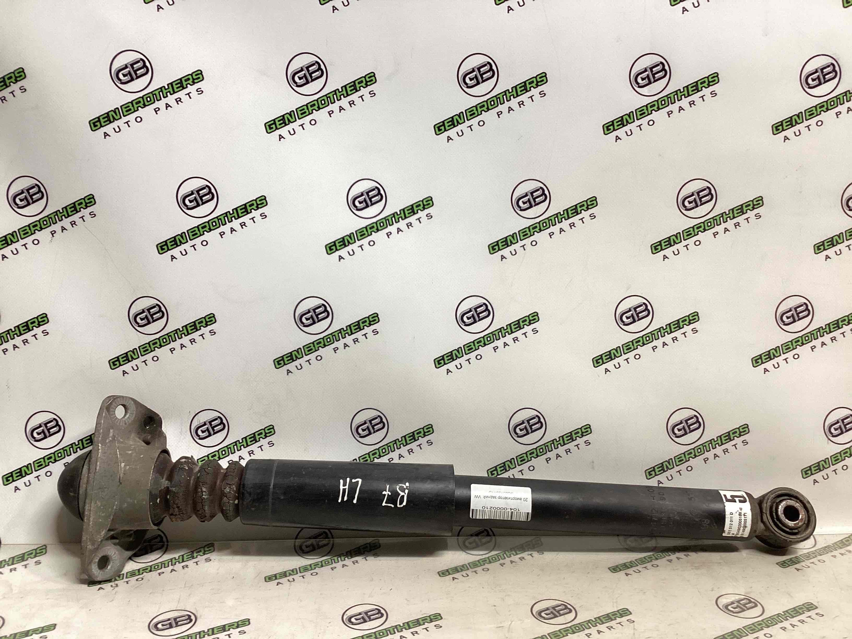 Амортизатор задній лівий