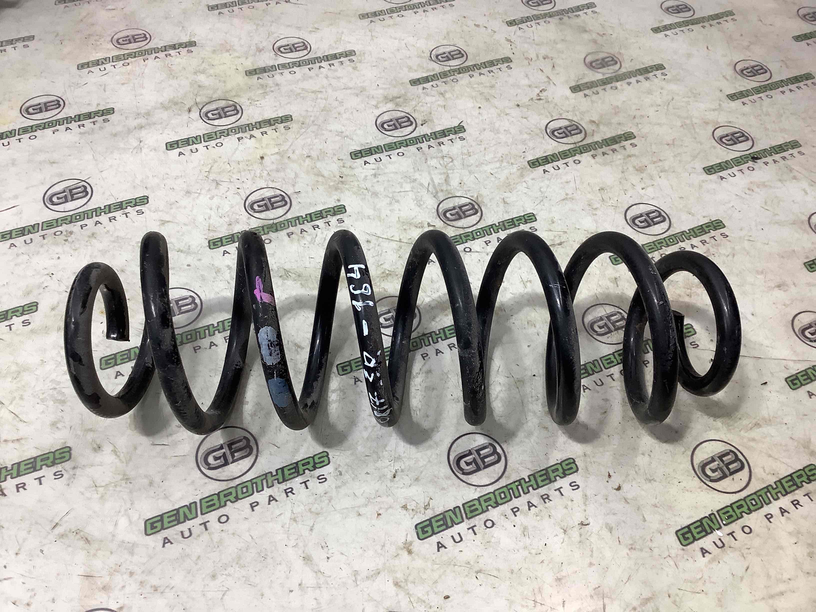 Пружина задня