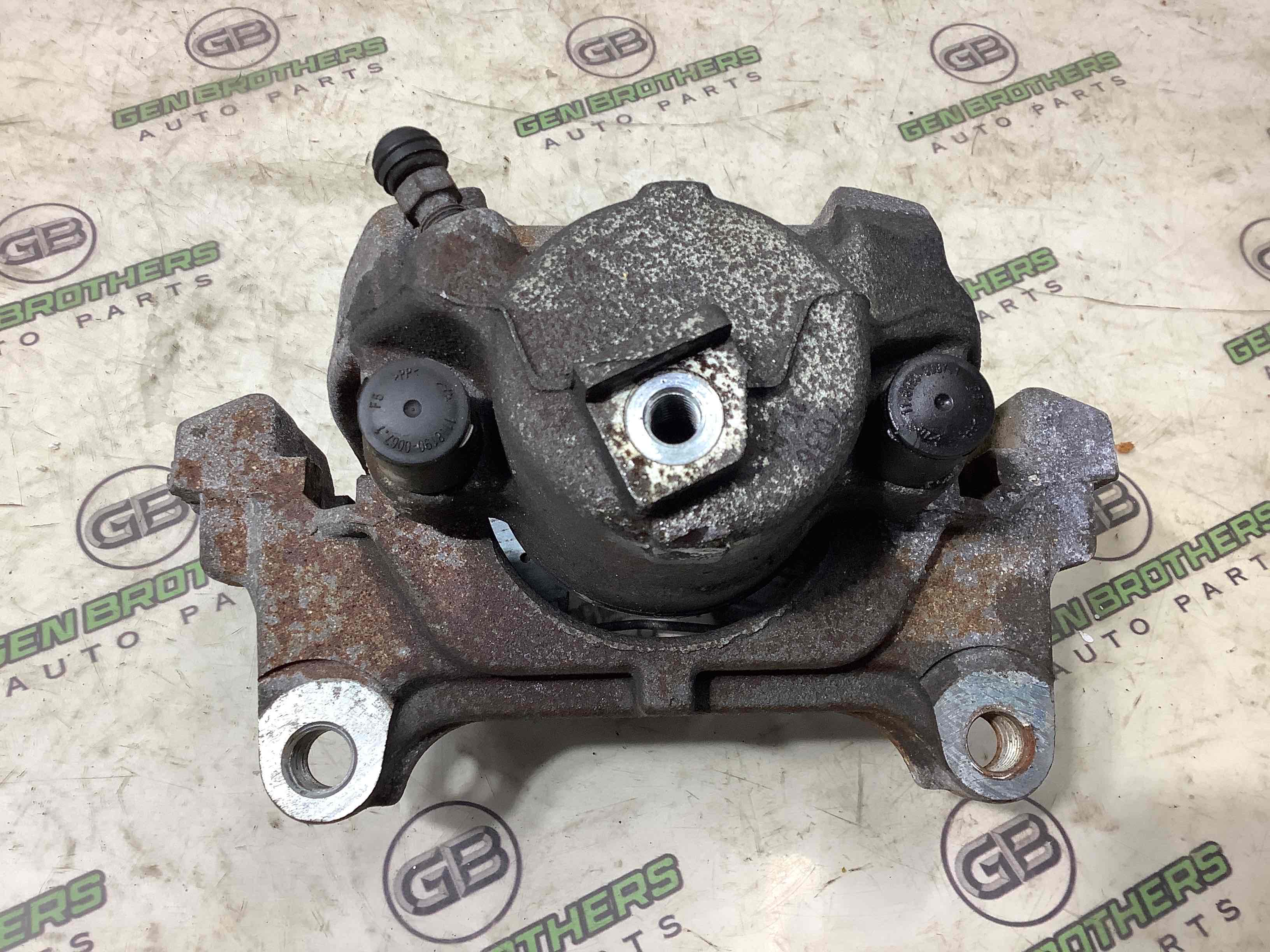 Супорт передній лівий