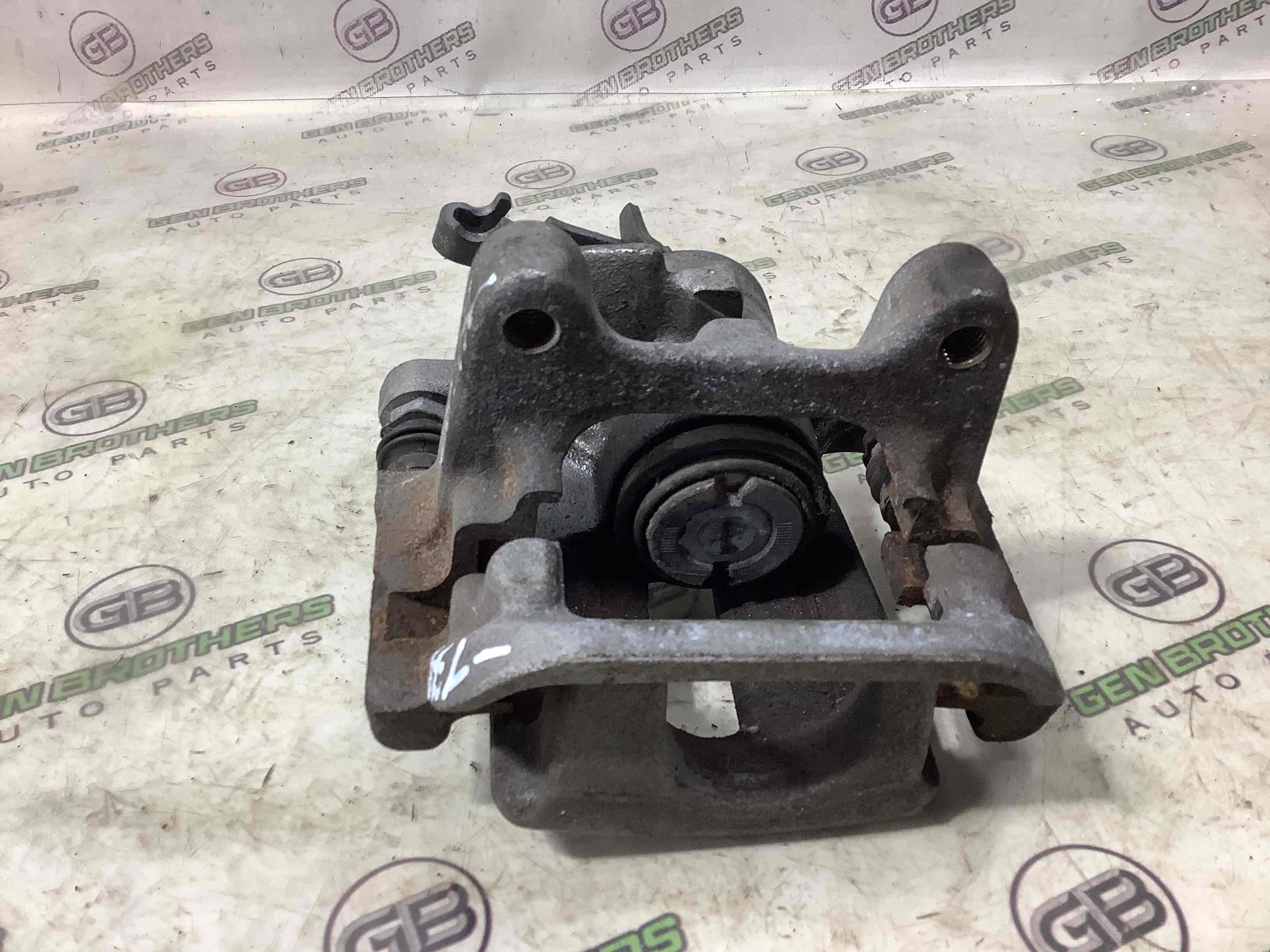 Супорт задній лівий