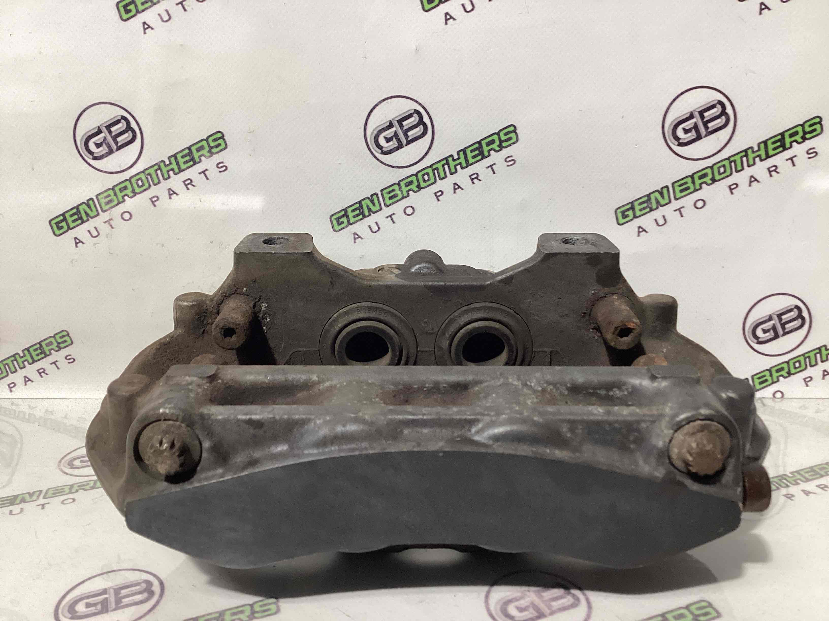 Супорт задній правий