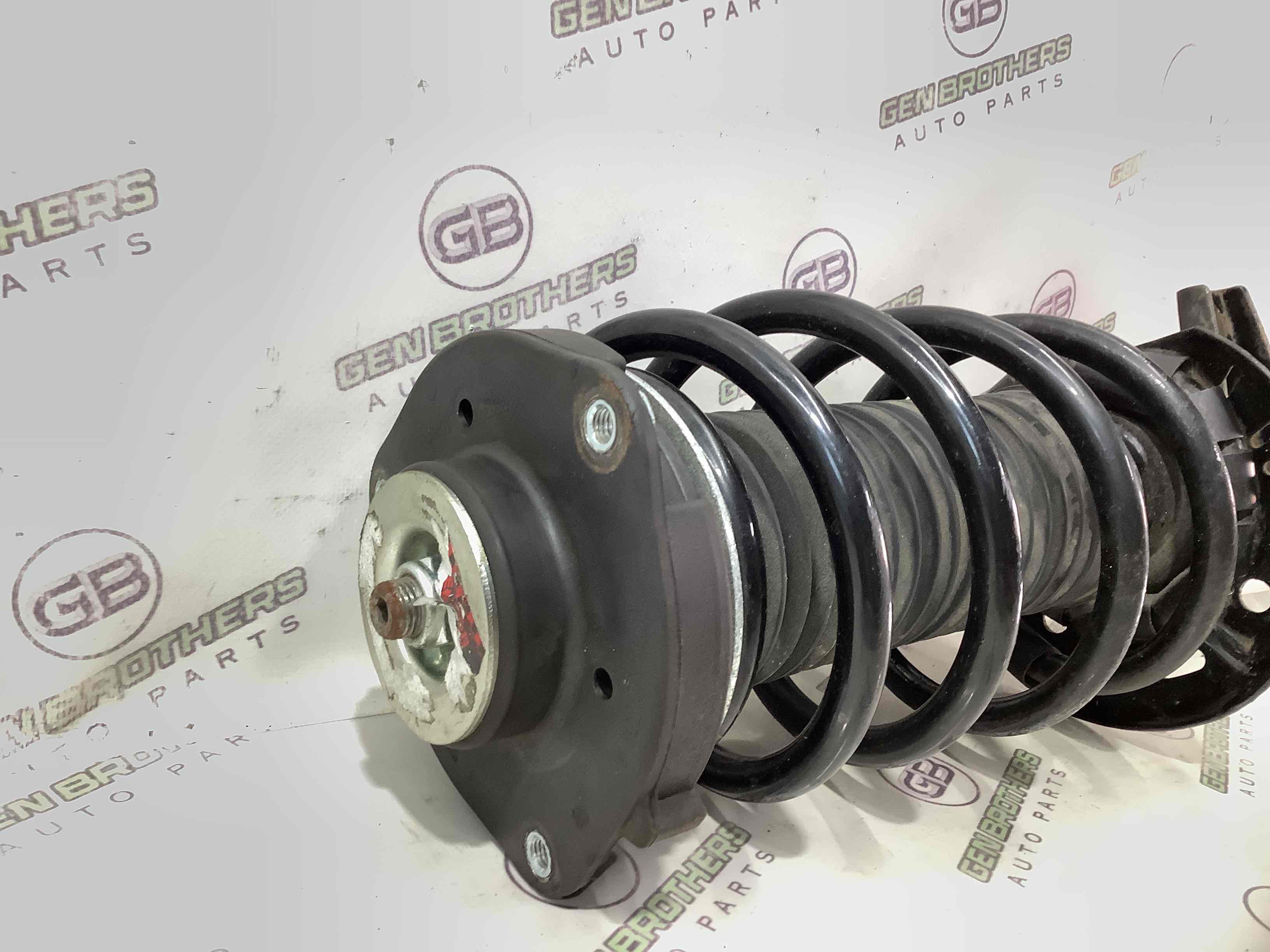 Стійка амортизатора у зборі