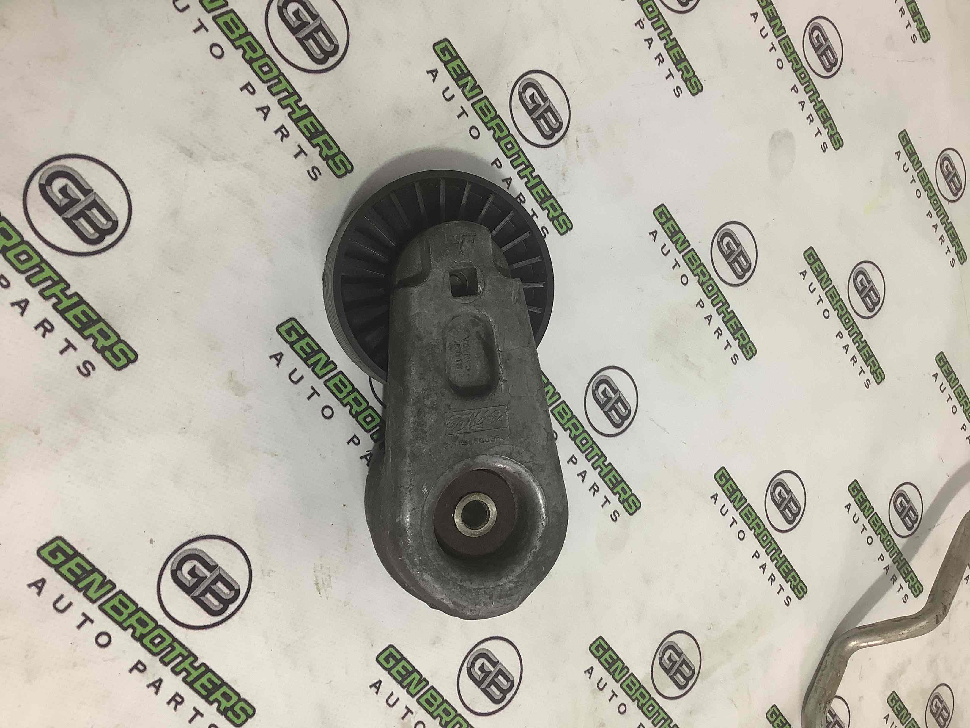 Механізм натягу ременя, ланцюга, ролика