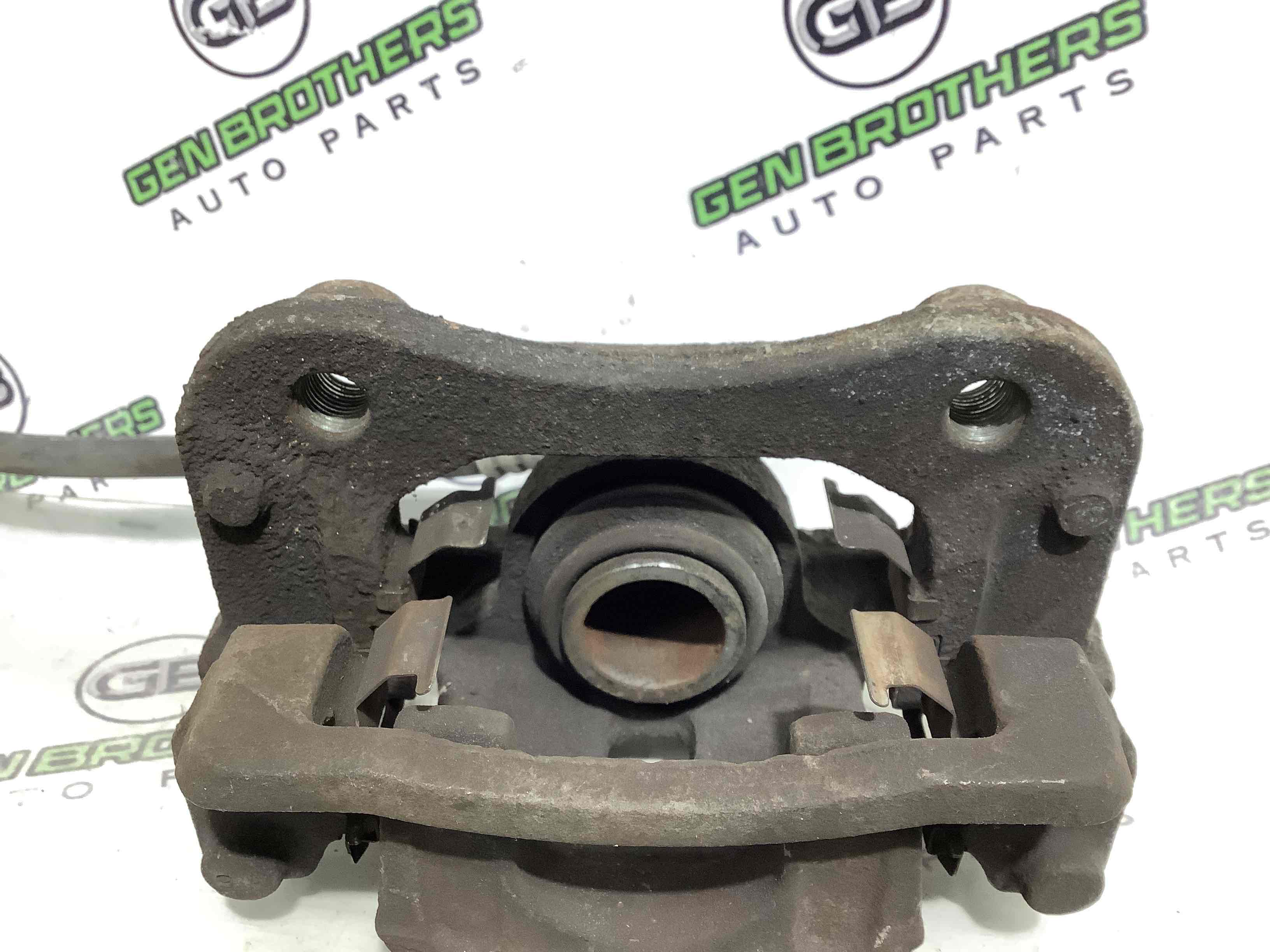 Супорт задній лівий