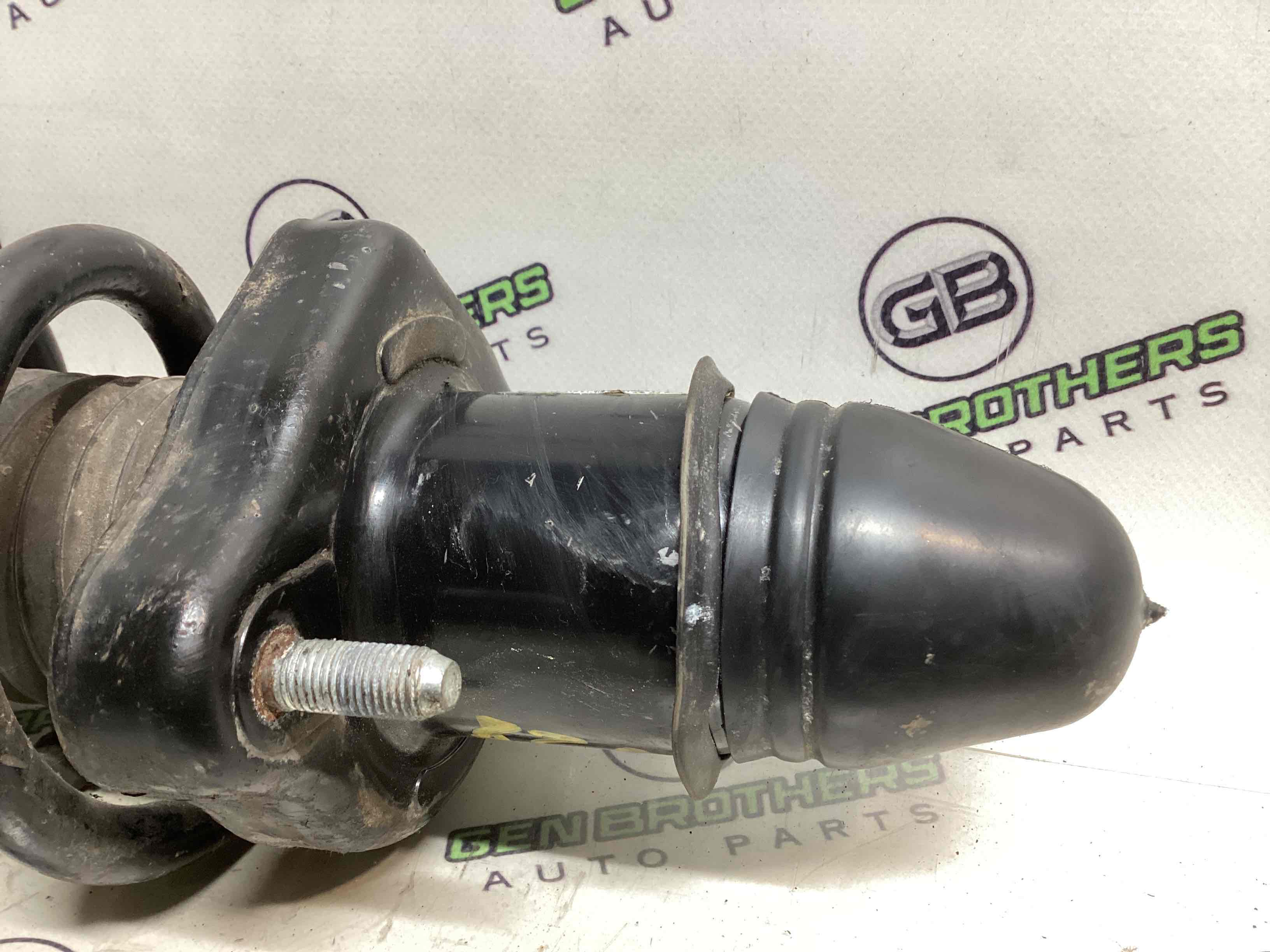 Стійка амортизатора у зборі