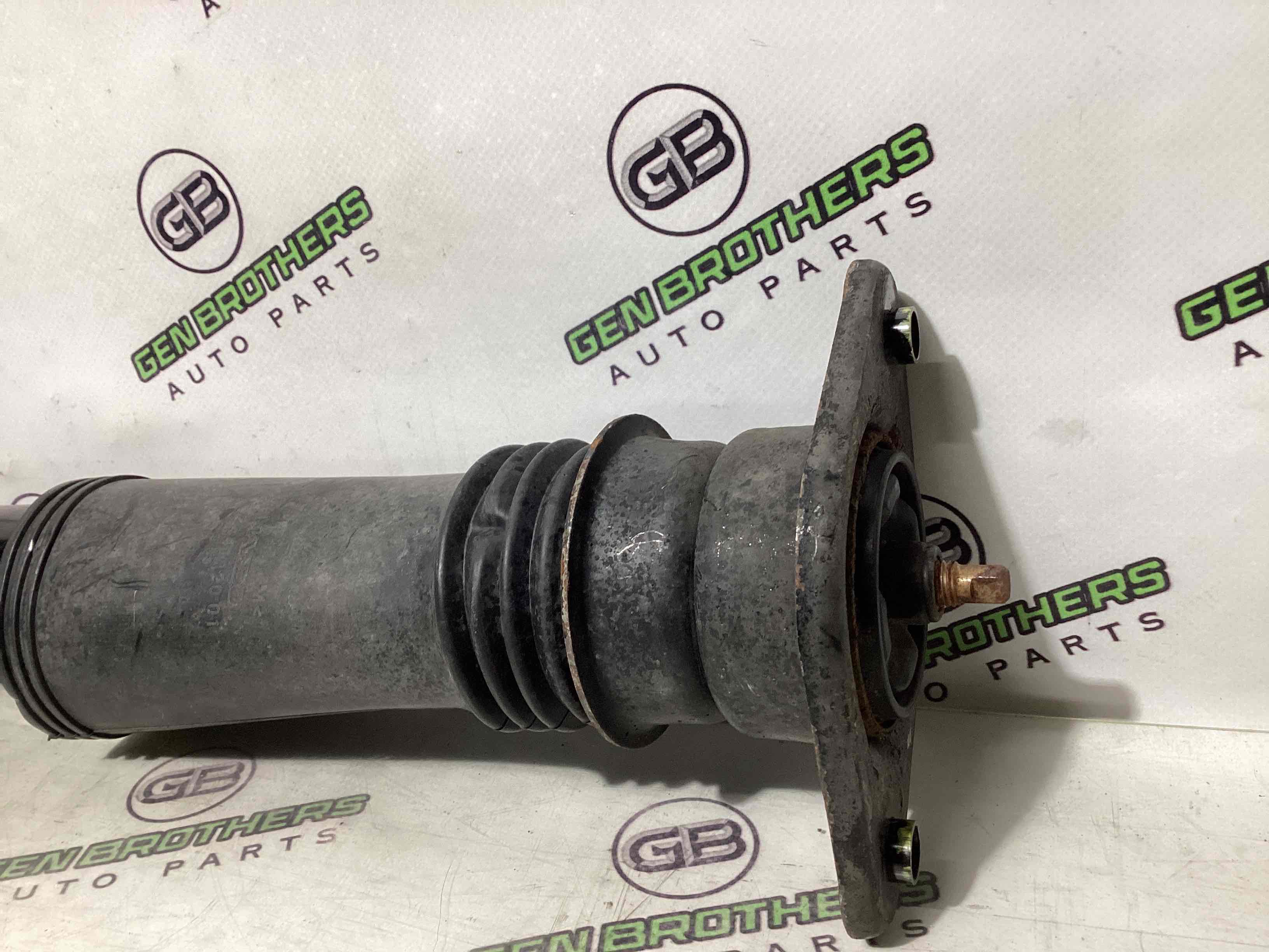 Амортизатор задний левый