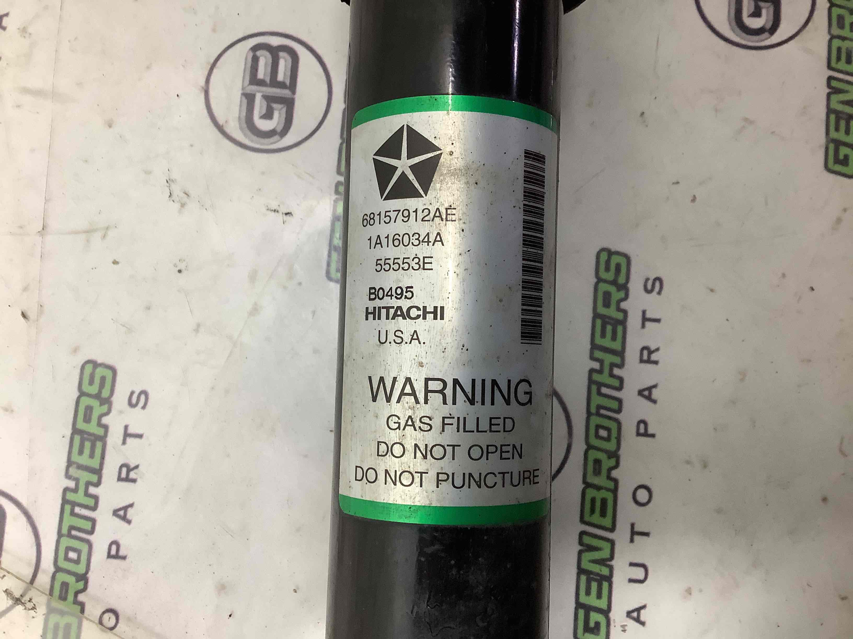 Амортизатор задній лівий