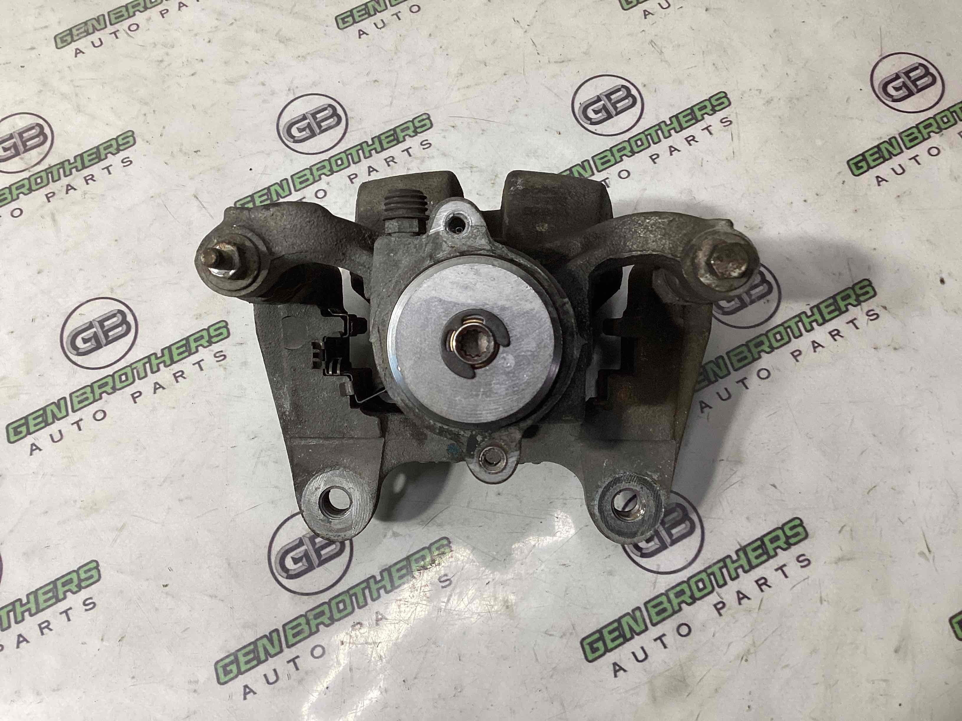 Супорт задній правий