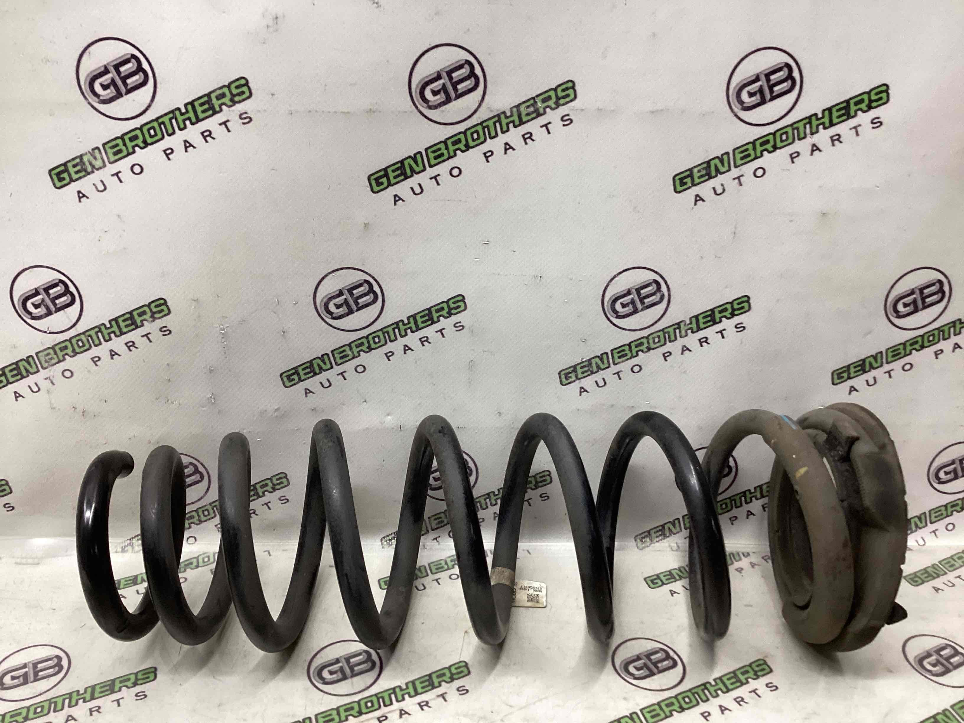 Пружина задня